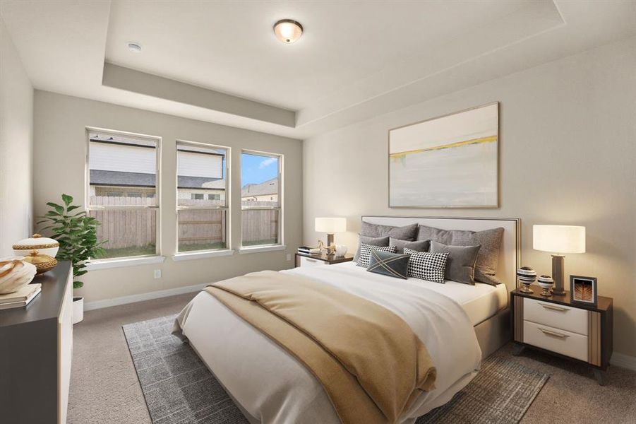 The primary bedroom is generously sized, creating a tranquil and spacious retreat that offers ample room for relaxation. Featuring plush carpet, high ceilings, fresh paint, and large windows that lets in natural lighting throughout the day.