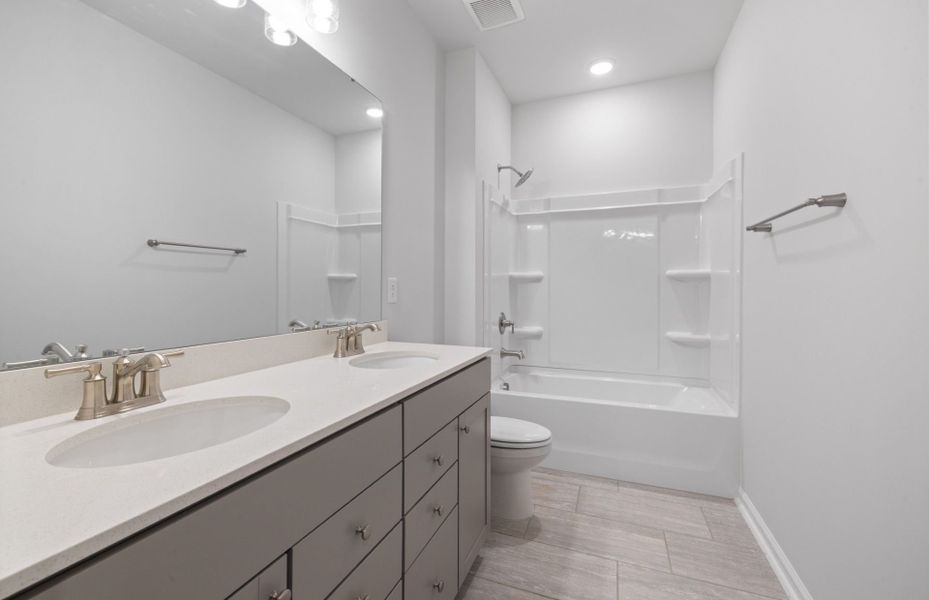 Furnished interior view inside a new home in Exchange at 401, Raleigh (Image 9).