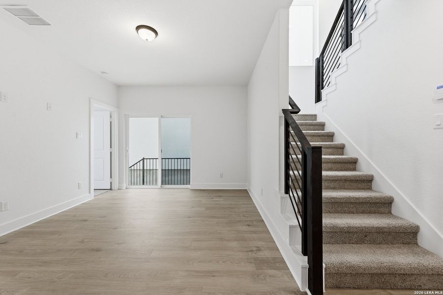 Spacious, unfurnished interior of a new home in Centero at Stone Oak, San Antonio (Image 15).