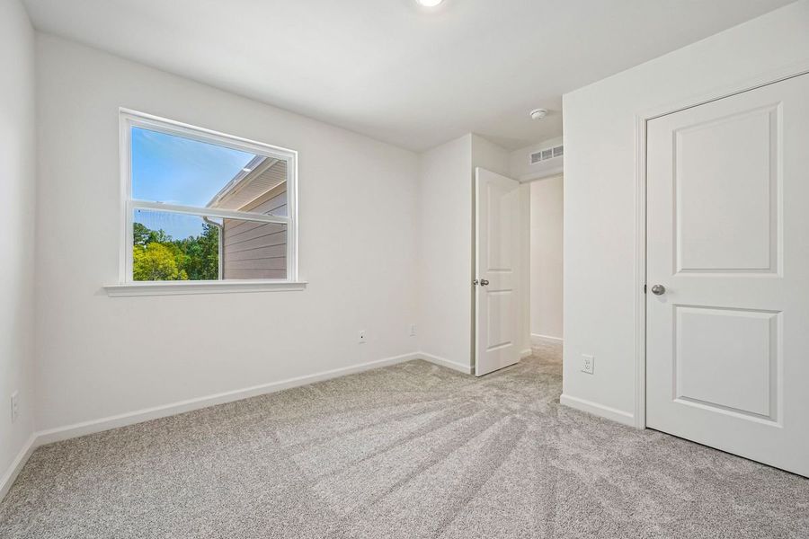 Spacious, unfurnished interior of a new home in Brooks Mill - Edge Series, Durham (Image 7).