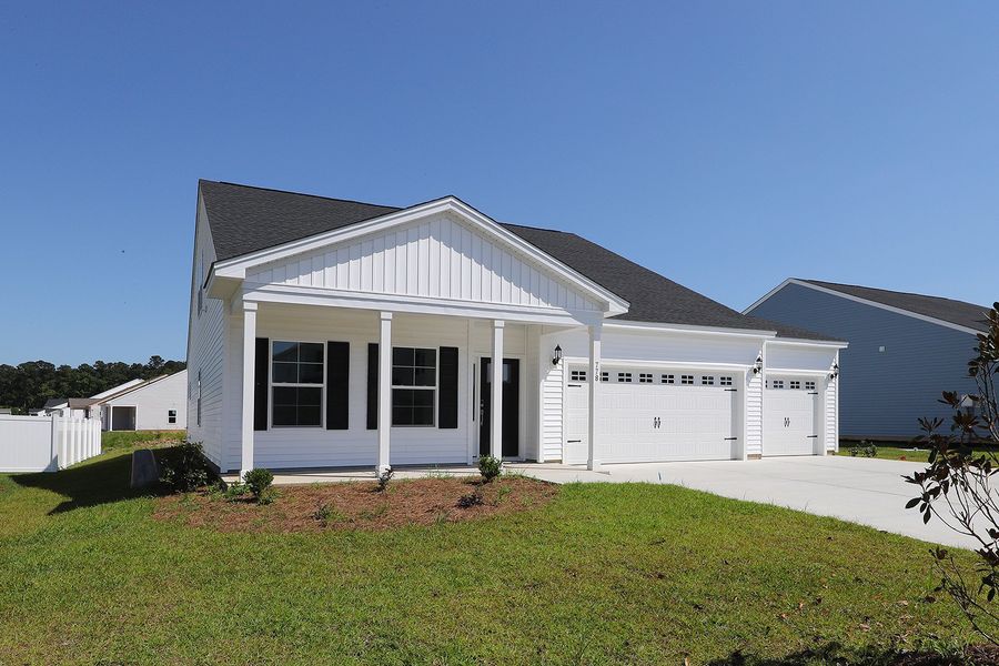 Front exterior of a new home in Allston Park, Calabash, NC, highlighting curb appeal (Image 2). Front exterior of a new home in Allston Park, Calabash, NC, highlighting curb appeal (Image 2).
