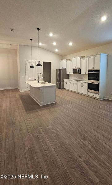 Furnished interior view inside a new home in Stables at Cary Forest, Bryceville (Image 3).