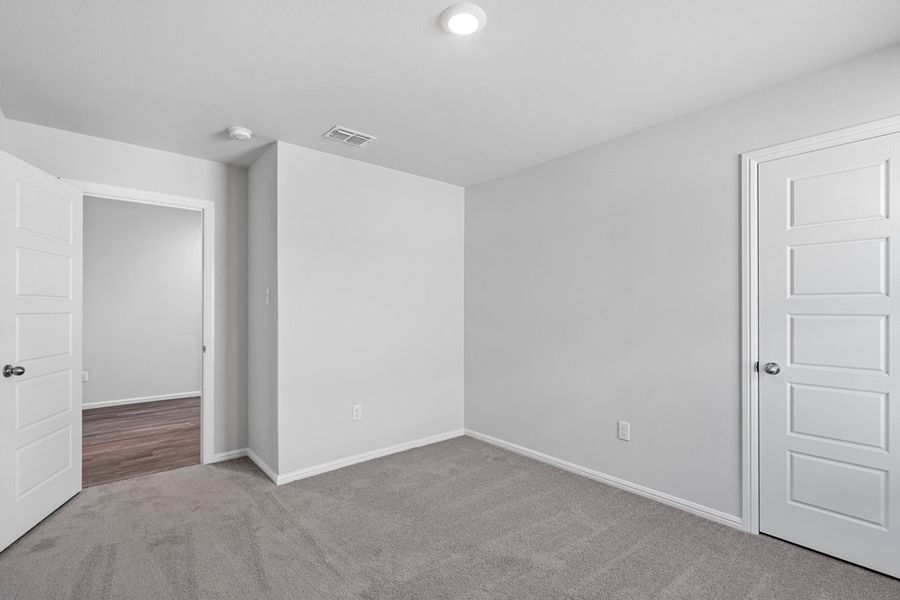 Representative unfurnished interior of a home built from the TEXAS CALI by D.R. Horton in Faculty Row, Abilene (Image 46).