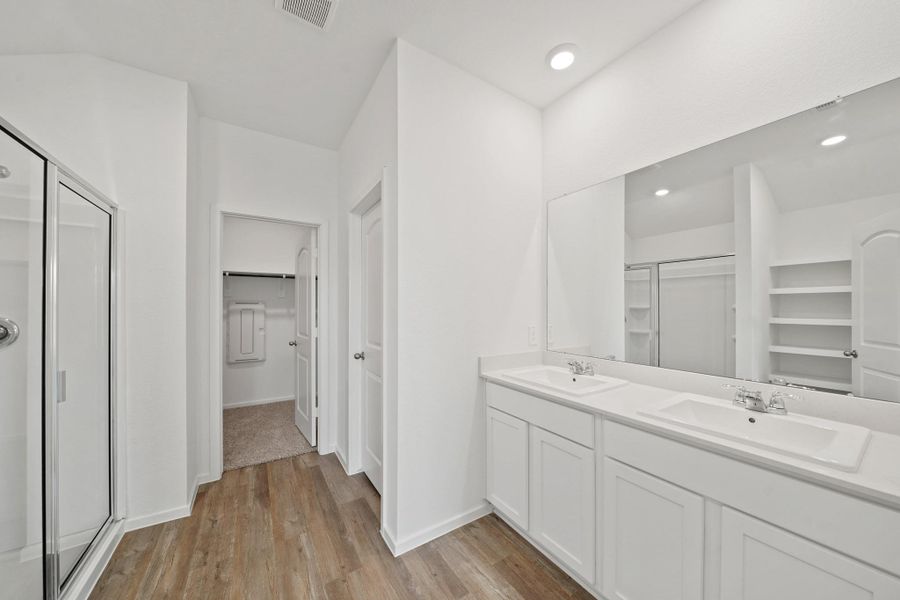 Furnished interior view inside a new home in Sunterra Lakes, Katy (Image 4).