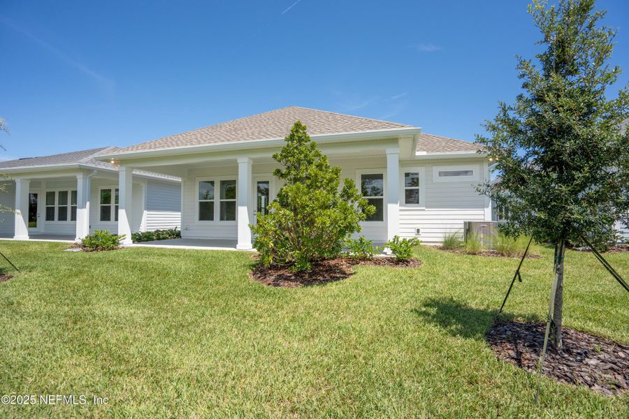 Exterior details and patio area of a home in Madeira, St. Augustine (Image 22).