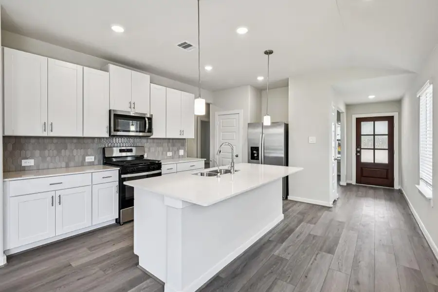 Photo is not of the actual home, but is an inspirational photo of builder’s model home and may depict options, furnishings, and/or decorator features that are not included