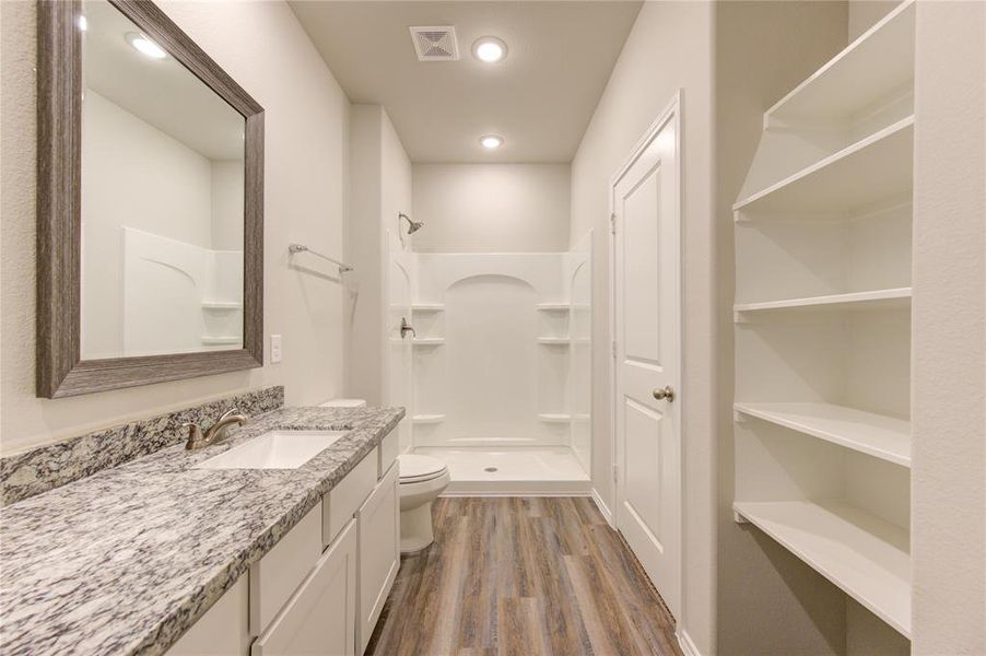 Oversized master shower with ceramic tile walls