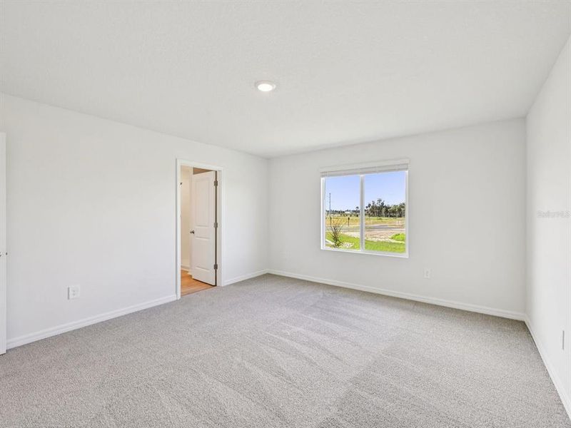 Spacious, unfurnished interior of a new home in Oakfield Trails - Premier Series, Parrish (Image 11).
