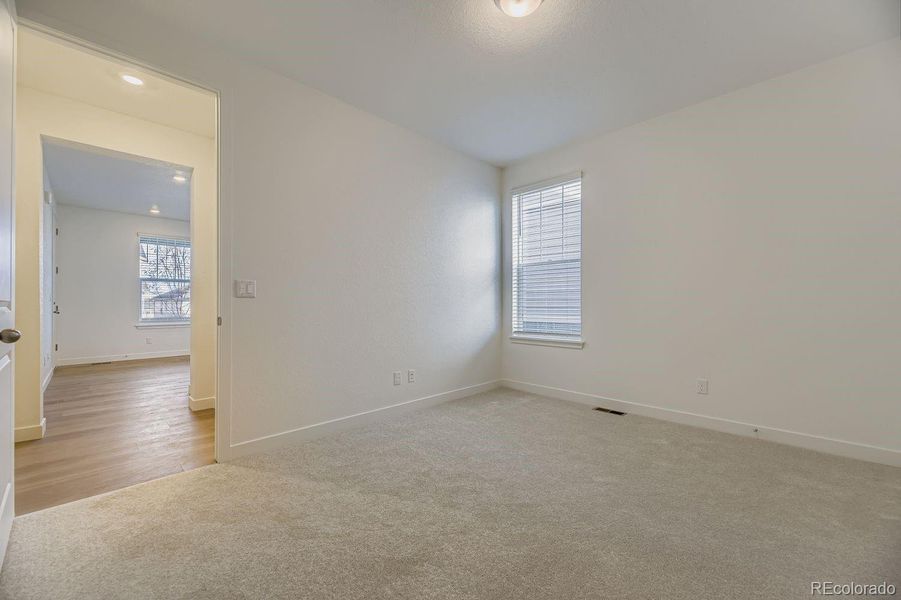Spacious, unfurnished interior of a new home in Newlin Crossing: The Monarch Collection, Parker (Image 13). Spacious, unfurnished interior of a new home in Newlin Crossing: The Monarch Collection, Parker (Image 13).