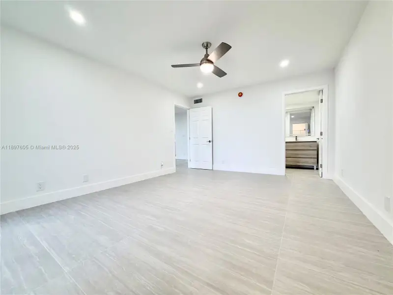 Spacious, unfurnished interior of a new home in , Lauderdale Lakes (Image 20).