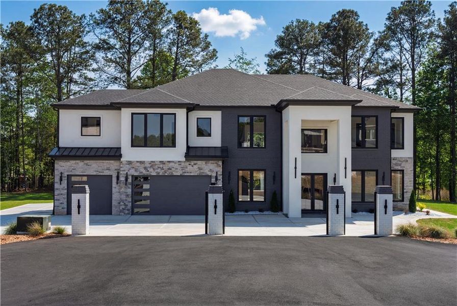 Front exterior of a new home in , Buford, GA, highlighting curb appeal (Image 29).