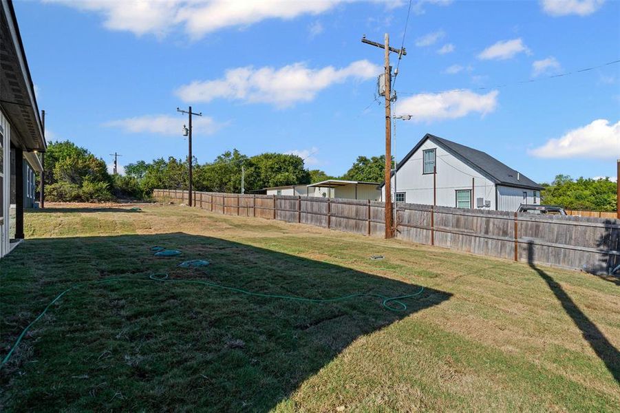 Exterior details and patio area of a home in , Granbury (Image 26).