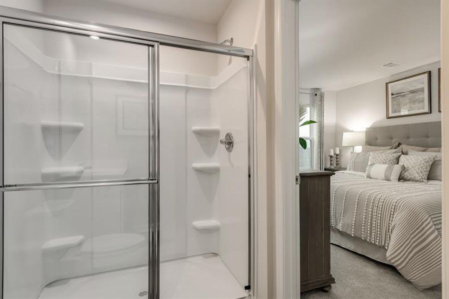 Representative furnished interior of a home built from the Tate by Ryan Homes in Middle Creek Village Coastal Cottages & Villas, Bolivia (Image 17).