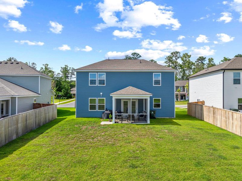Exterior details and patio area of a home in Bradford Pointe, Summerville (Image 24).