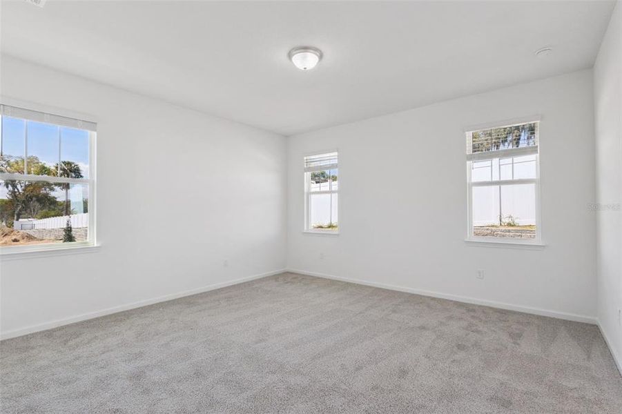 Spacious, unfurnished interior of a new home in Grand Isle, Grand Island (Image 20).