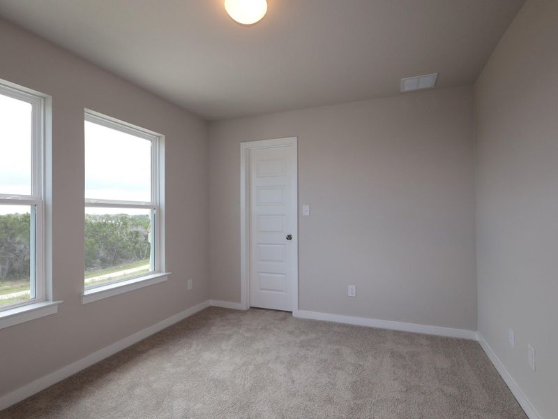 Spacious, unfurnished interior of a new home in Heritage, Dripping Springs (Image 9).