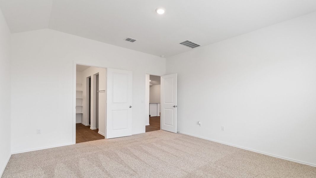 Representative unfurnished interior of a home built from the The Juniper by D.R. Horton in Palomino, Manor (Image 17).
