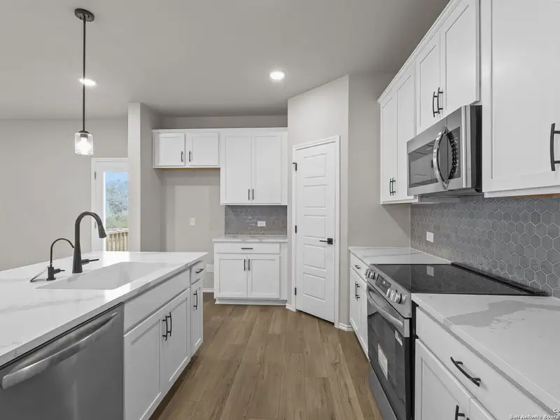 Furnished interior view inside a new home in Royal Crest, San Antonio (Image 6).