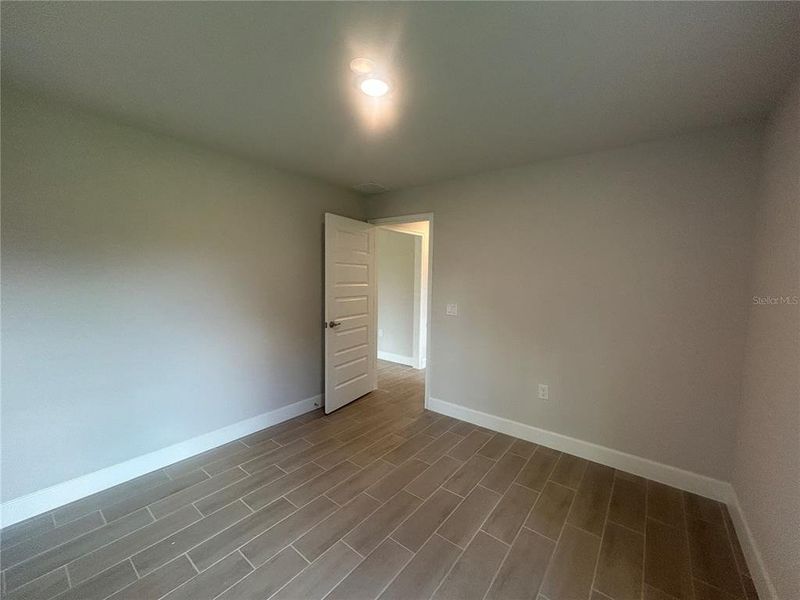 Spacious, unfurnished interior of a new home in Deep Creek, Punta Gorda (Image 9).