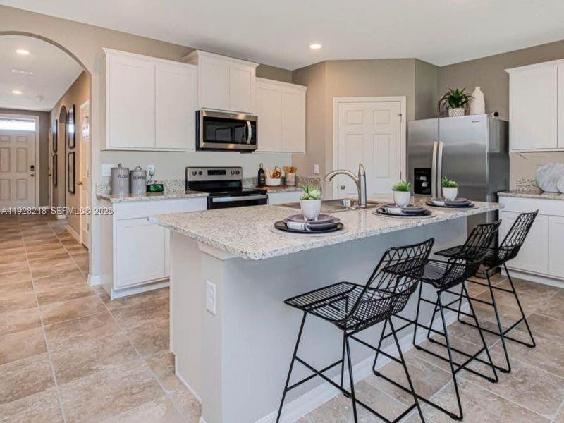 Furnished interior view inside a new home in , Fort Pierce (Image 4). Furnished interior view inside a new home in , Fort Pierce (Image 4).