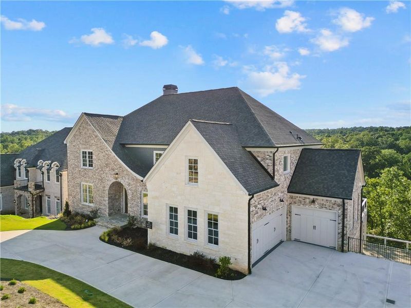 Front exterior of a new home in , Suwanee, GA, highlighting curb appeal (Image 23).
