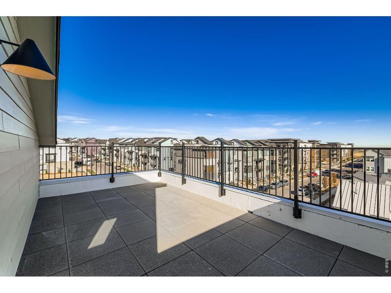 Exterior details and patio area of a home in Parkside West at Baseline, Broomfield (Image 26).