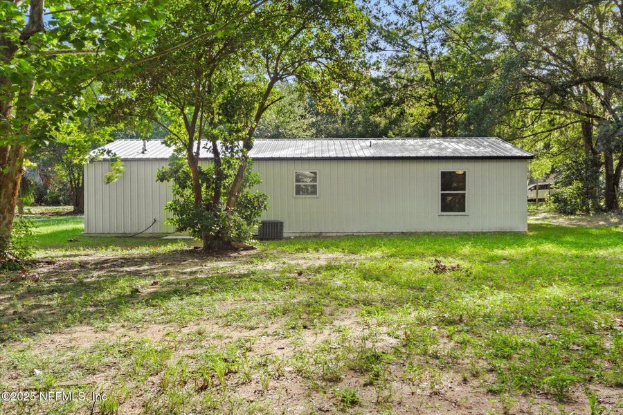 Front exterior of a new home in , Interlachen, FL, highlighting curb appeal (Image 21).