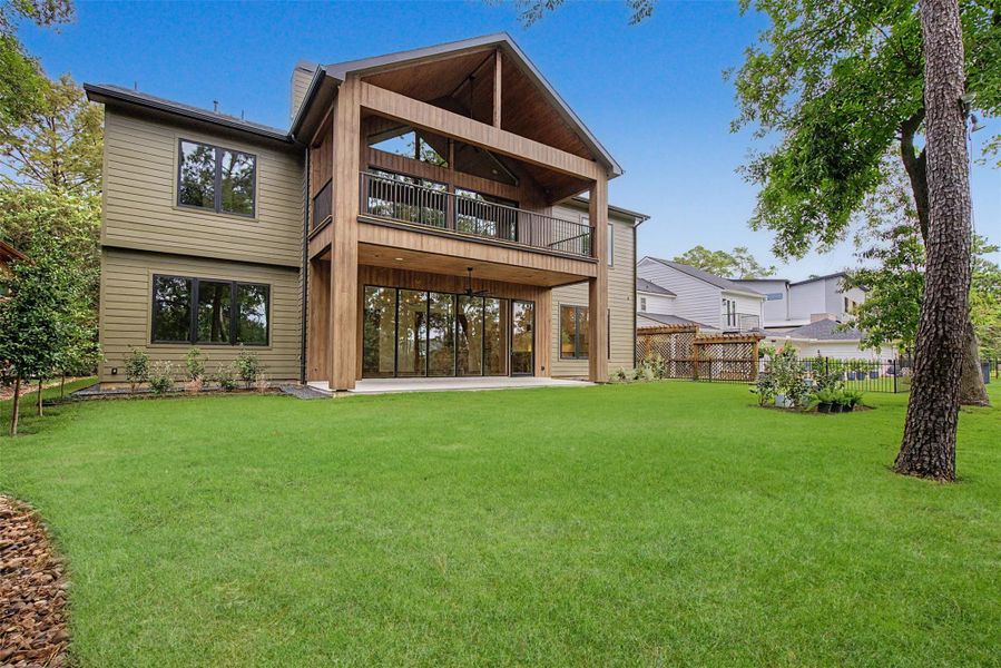 Exterior details and patio area of a home in , The Woodlands (Image 31).