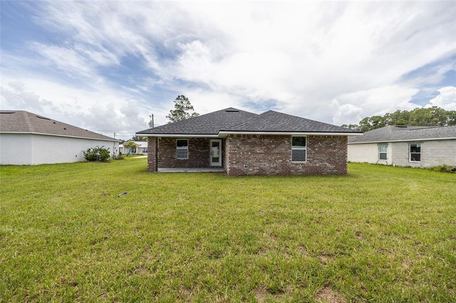 Exterior details and patio area of a home in Palm Coast, Palm Coast (Image 4).