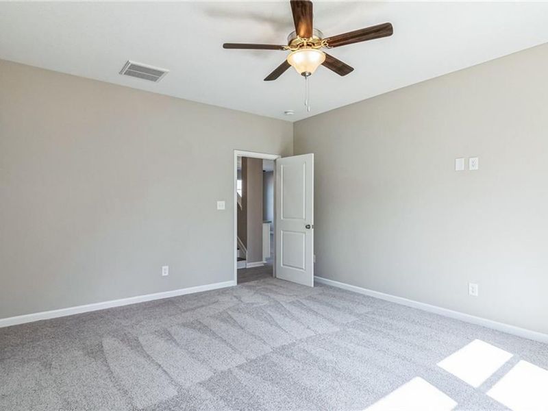 Spacious, unfurnished interior of a new home in Ivy Glen, Perry (Image 15).