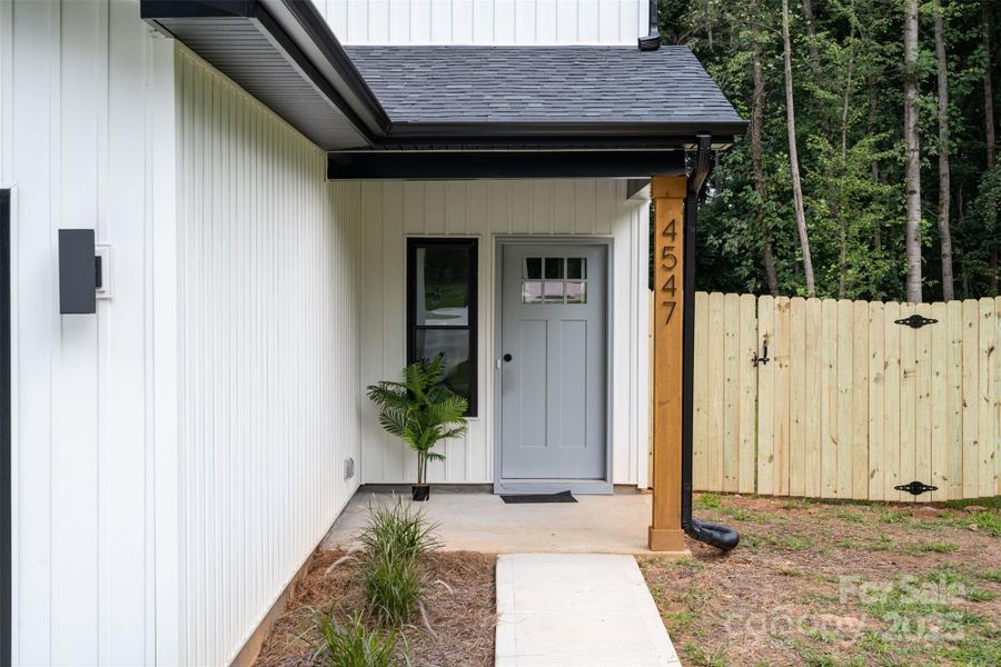 Front exterior of a new home in , Hickory, NC, highlighting curb appeal (Image 27).