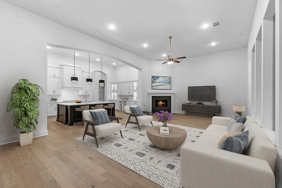 Virtually staged to show furniture placement, the family room is the heart and center of the home with a tile gas fireplace and views of the backyard. Virtually staged to show furniture placement, the family room is the heart and center of the home with a tile gas fireplace and views of the backyard.