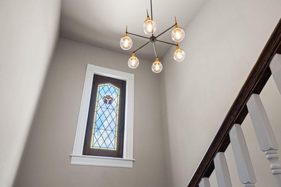 Notice the vintage reclaimed stainless glass window in the stairwell - your dose of classic charm in a modern, new construction build. Notice the vintage reclaimed stainless glass window in the stairwell - your dose of classic charm in a modern, new construction build.
