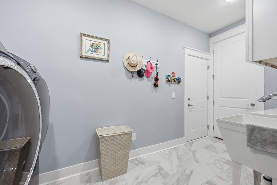Furnished interior view inside a new home in K. Hovnanian's® Four Seasons at Lakes of Cane Bay, Summerville (Image 25).