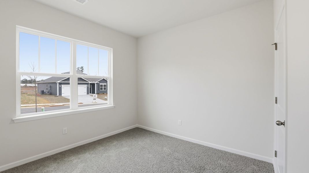 Spacious, unfurnished interior of a new home in Waverly Station, Greenwood (Image 17).