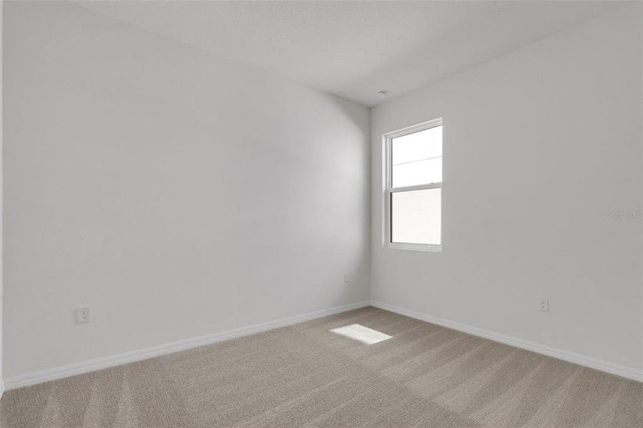 Spacious, unfurnished interior of a new home in Creekside Run at Babcock Ranch, Punta Gorda (Image 14).