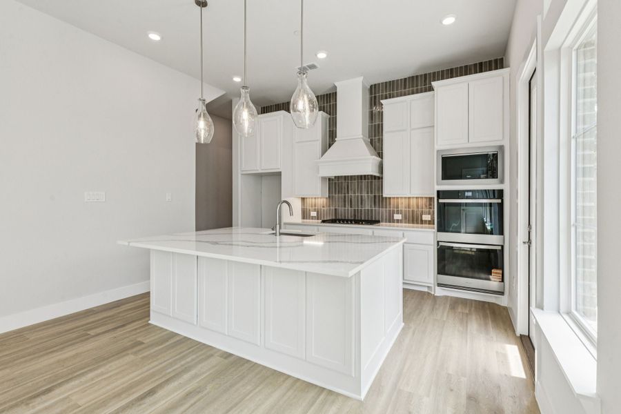 Representative furnished interior of a home built from the Hamilton by Centre Living Homes in Newman Village Townhomes, Frisco (Image 9).