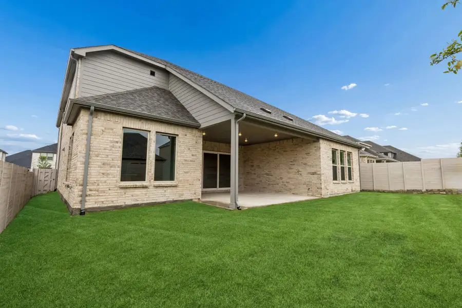 Exterior details and patio area of a home in Painted Tree Lakeside, McKinney (Image 4).