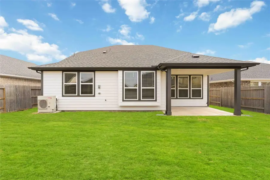 Exterior details and patio area of a home in Sunterra, Katy (Image 4). Exterior details and patio area of a home in Sunterra, Katy (Image 4).