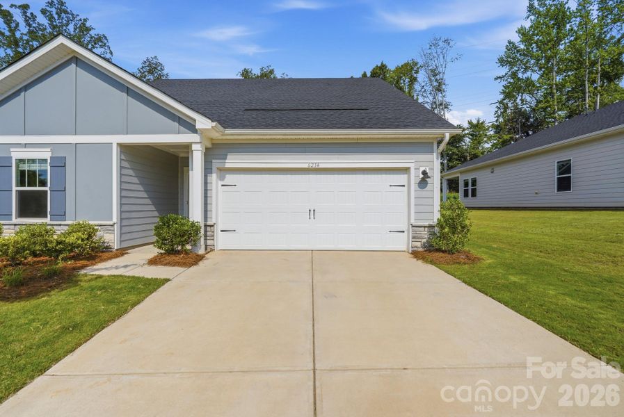 Front exterior of a new home in , Charlotte, NC, highlighting curb appeal (Image 23).