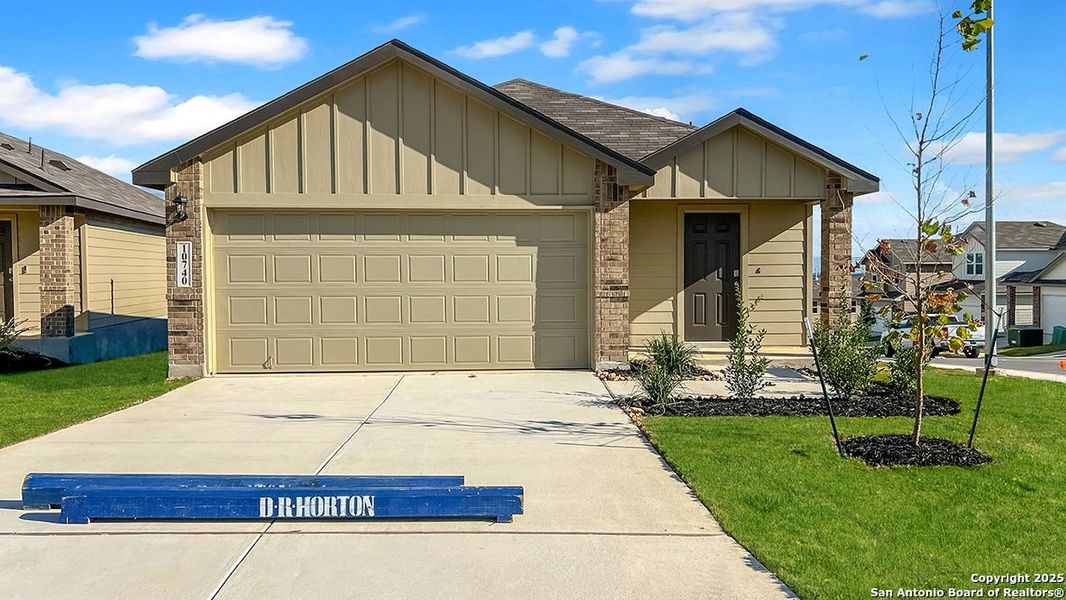 Front exterior of a new home in Applewood, San Antonio, TX, highlighting curb appeal (Image 2). Front exterior of a new home in Applewood, San Antonio, TX, highlighting curb appeal (Image 2).