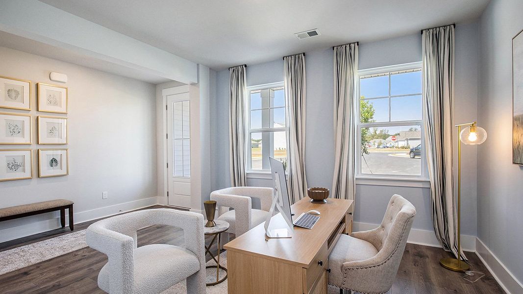 Representative furnished interior of a home built from the HARBOR OAK by D.R. Horton in The Forest at Black Bear, Longs (Image 9).