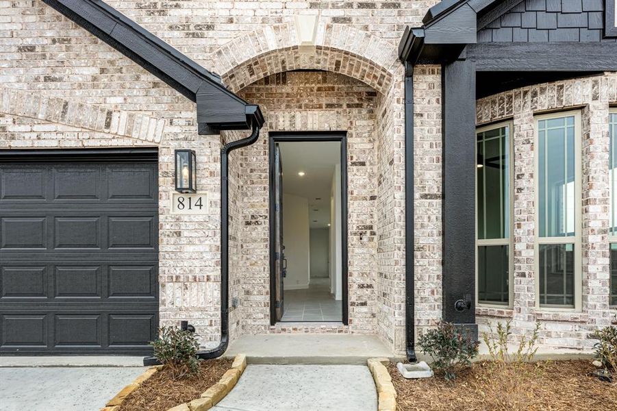 Exterior details and patio area of a home in Grand Heritage, Lavon (Image 26).