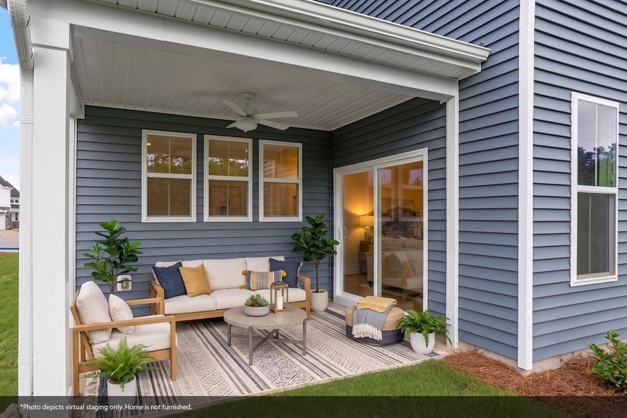 Exterior details and patio area of a home in Renaissance at White Oak, Garner (Image 3). Exterior details and patio area of a home in Renaissance at White Oak, Garner (Image 3).