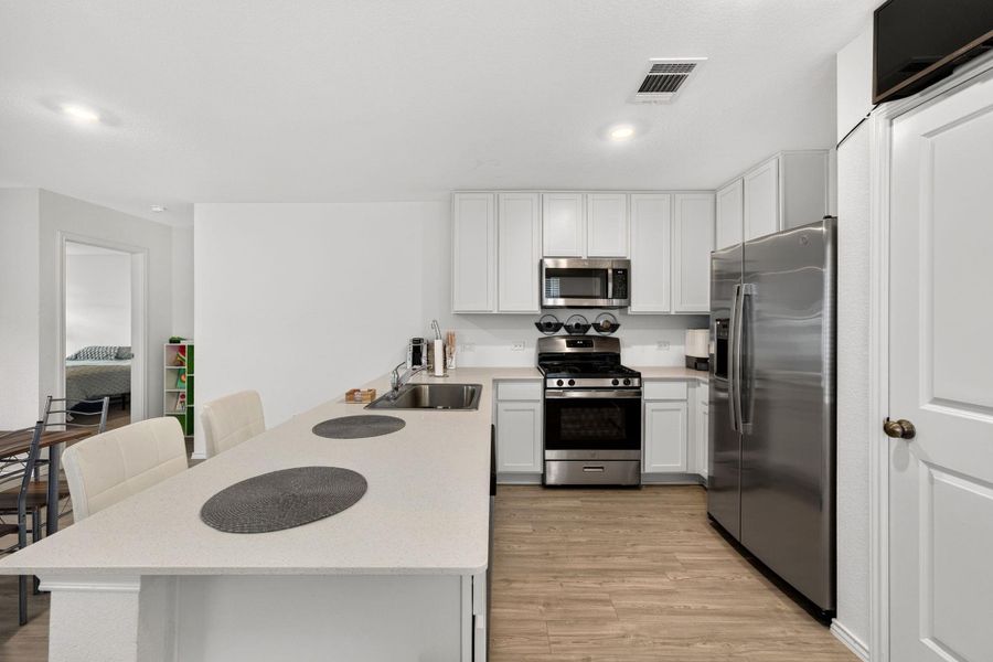 Furnished interior view inside a new home in Elm Creek, Elgin (Image 25).