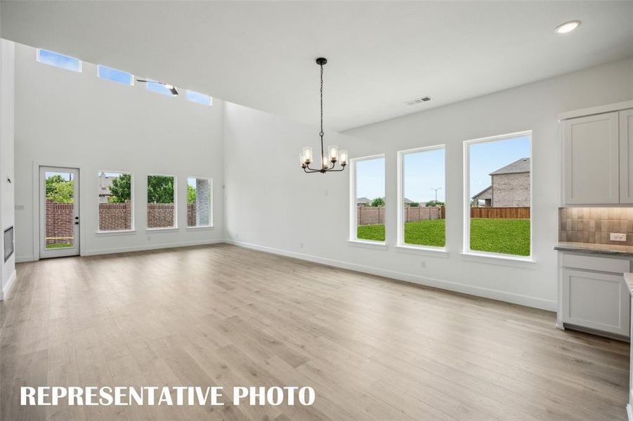 Whether it's grand dinner parties or cozy family meals, this dining room is perfect for any occasion!  REPRESENTATIVE PHOTO