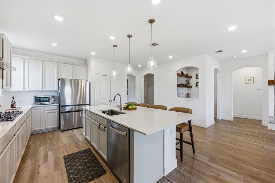 Furnished interior view inside a new home in West Cypress Hills, Spicewood (Image 7).