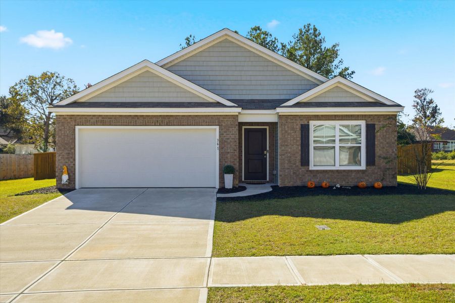 Front exterior of a new home in Stone Ridge, Moncks Corner, SC, highlighting curb appeal (Image 25).