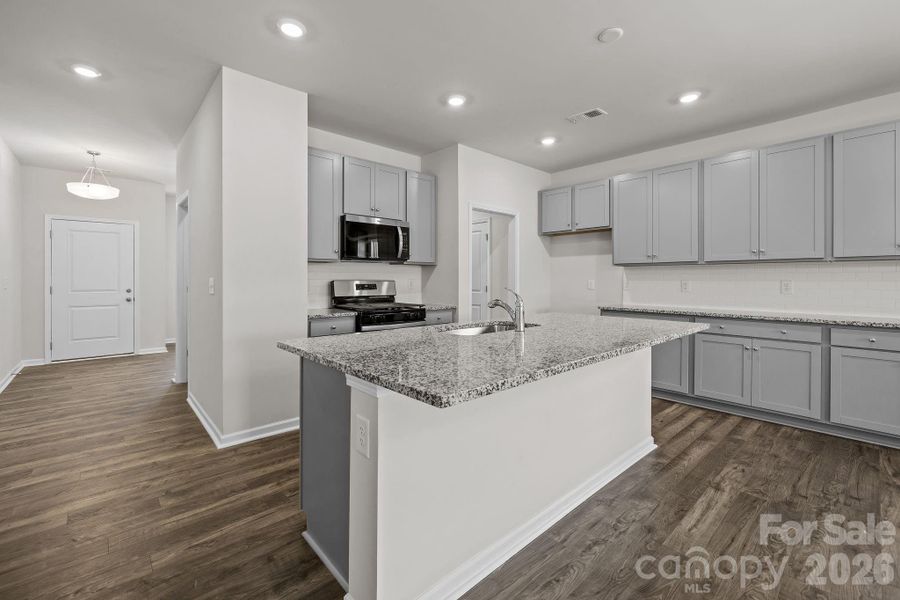 Furnished interior view inside a new home in McFarland Estates, York (Image 11).