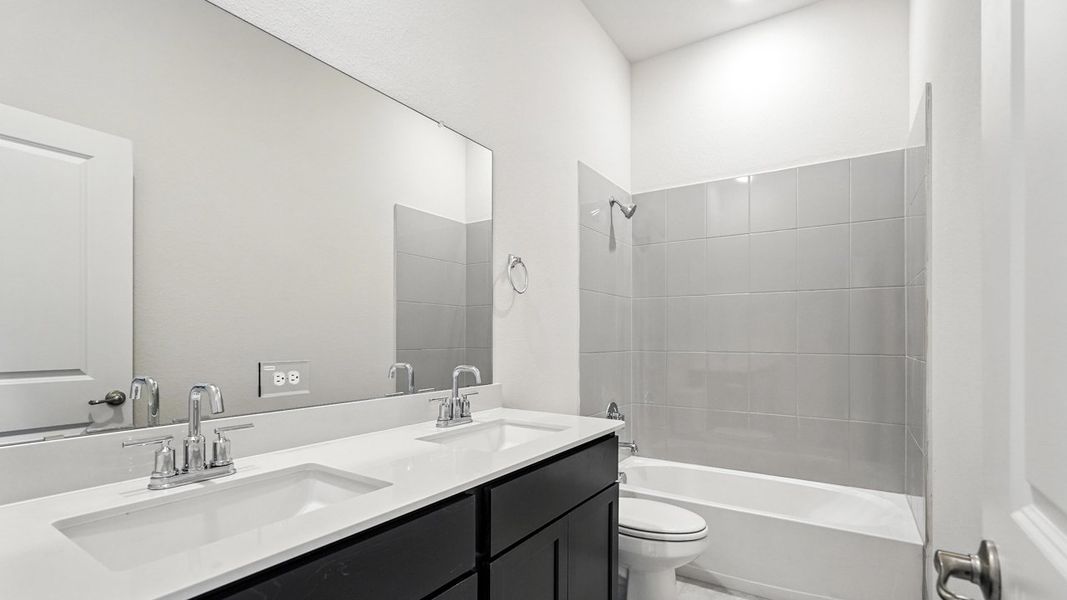 Representative furnished interior of a home built from the Ivery by D.R. Horton in Madera, Royse City (Image 14).